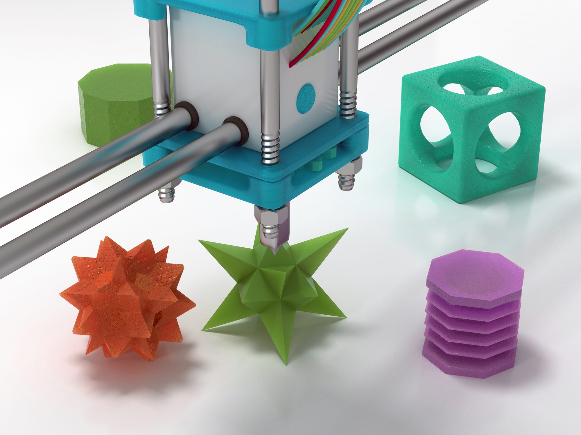 3D printer creating colorful geometric shapes.