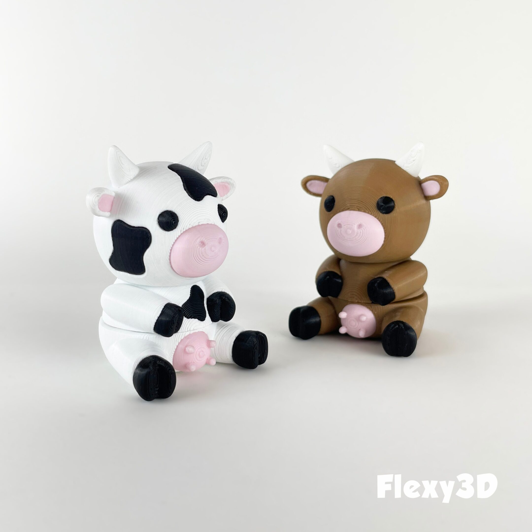 Two cute 3D cartoon animals sitting side by side on a white background.